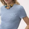 コットンクロシェニットのクルーネックロゴトップ