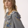 クレープ・デ・シンのスクエアネックのフリルトップス