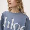 コットンジャージーのクロップド丈ボックスロゴTシャツ