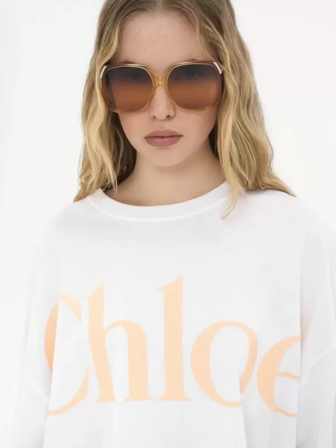 コットンジャージーのオーバーサイズクロップドロゴTシャツ